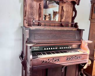 Beautifully carved antique pedal pump parlor organ by Williams Organ Company