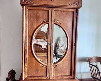 Victorian Sampler Collection: Armoire by Lexington. Made from quarter sawn oak and features mirrored doors & drawer.