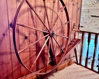 Large antique spinning wheel (we have a large and a small one)