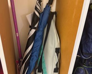 tennis rackets and umbrellas