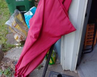 Outside patio umbrella with weighted stand