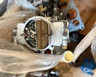 . . . brand new Holley carburetor