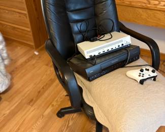 . . . office chair and VCR player and X-box