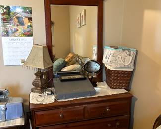. . . mirrored dresser in walnut tones