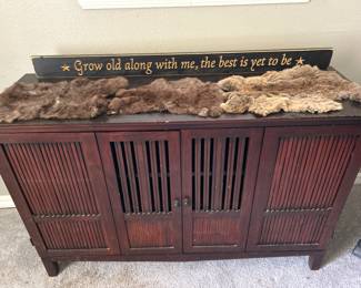 3 Fur Pelts. Love that sign too!