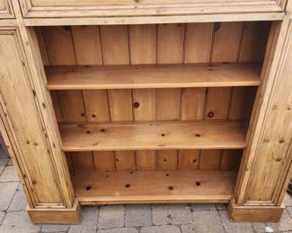 Antique English Pine Fireplace Mantel repurposed into a bookcase.
