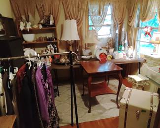 2 pedestals, small table, strapped storage box, lamps, Christmas trees and decor, beautiful blown glass balls, curtains go with the house.