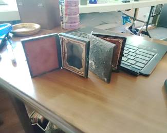 Vintage daguerreotype folding photo frame.