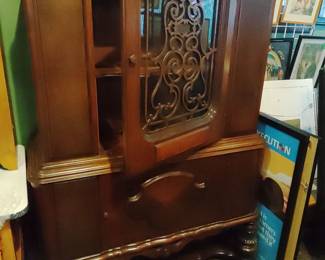 Beautiful quality hutch. The gentle curves hold the special items in the old world charm. Large lower
shelf space. 72"h x 46"w