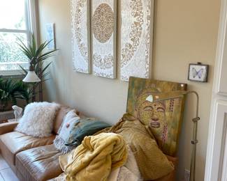 Leather sofas - and art of the buddha