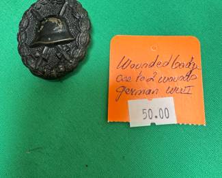 #129 - $50 - Wounded badge one - two wounds German WW II