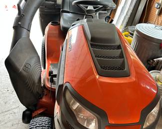 #98 - $1,350 - The lawn mower Husqvarna Model 440000 with bagger Air induction deck 22HP Briggs & Stratton Intek V-Twin - 46" Cutting deck reinforced. Bought in 2018 -