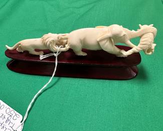 #118 - $200 - Hand carved Elephant and tiger on wooden base