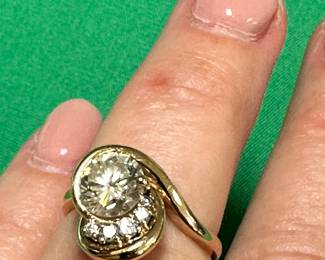 #116 - $ call for info - 14k ring with 5 small diamonds 1.51 larger diamond size 51/2