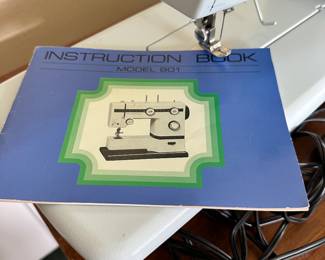 #97A - $40 - Derrels Sewing machine in travel case model 901