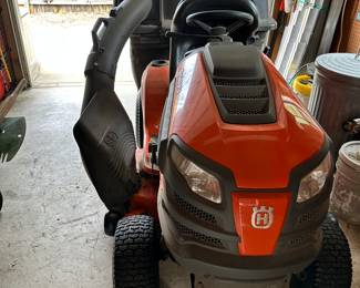 #98 - $1,350 - The lawn mower Husqvarna Model 440000 with bagger Air induction deck 22HP Briggs & Stratton Intek V-Twin - 46" Cutting deck reinforced. Bought in 2018 -