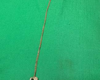 #104 - $150 - 14kt gold necklace 17" with open diamond heart