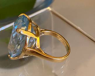 Blue topaz on 14kt yellow gold setting size 5 - $400