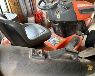 #98 - $1,350 - The lawn mower Husqvarna Model 440000 with bagger Air induction deck 22HP Briggs & Stratton Intek V-Twin - 46" Cutting deck reinforced. Bought in 2018 -