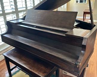 #38 - $500 or best offer - Antique Wurlitzer piano with ivory keys with bench needs restoration