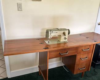 #91 - $400 - Sewing table vintage with Bernina model 740 Favorite made in Switzerland 69wx18dx30t - with cabinet open
