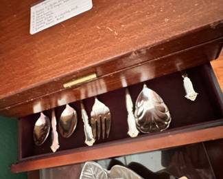 #65 - $120 - International deep silver set of flatware in chest Golden Chadwick