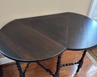 #41 - $250 - Unusual barley twist table with rounded sides 39wx25dx29t