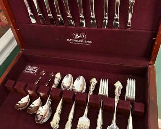 #65 - $120 - International deep silver set of flatware in chest Golden Chadwick
