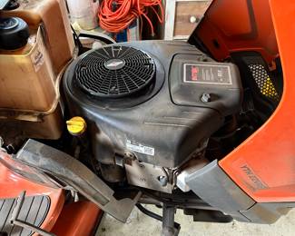 #98 - $1,350 - The lawn mower Husqvarna Model 440000 with bagger Air induction deck 22HP Briggs & Stratton Intek V-Twin - 46" Cutting deck reinforced. Bought in 2018 -