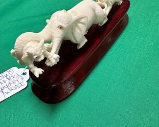 #118 - $200 - Hand carved Elephant and tiger on wooden base