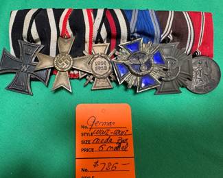 #126 - $786 - German WW II medal bar - 6 medals