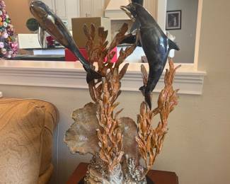 Donjo dolphin copper fill sculpture, signed, 2007