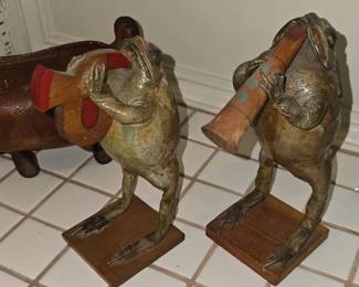Taxidermy frogs playing instruments