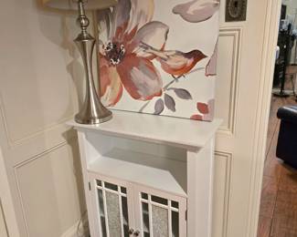 we have a variety of occasional tables, lamps and wall art