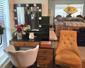 lighted Hollywood-style vanity with chair