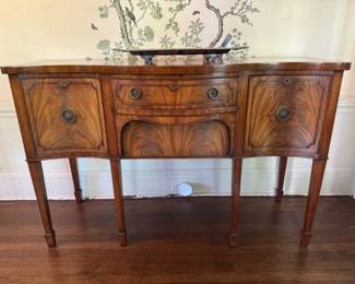 English flame mahogany serpentine sideboard