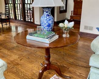 Oak tilt-top table 29"h x 36" diameter