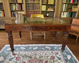 Antique English mahogany carved mahogany desk with tooled leather top 29.5"h x 53"w x 33"d