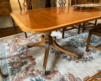 Regency-style banded mahogany dining table 29"h x 46"w x 68" long - plus three 18" leaves