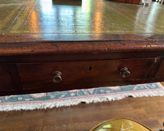 Antique English mahogany carved mahogany desk with tooled leather top 29.5"h x 53"w x 33"d