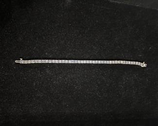 Signed SJM gemstone, tennis bracelet  