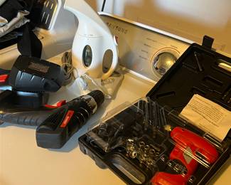 Some tools and a handheld steamer