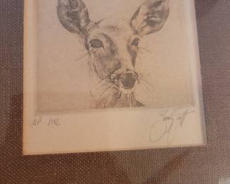 Many pieces of signed art