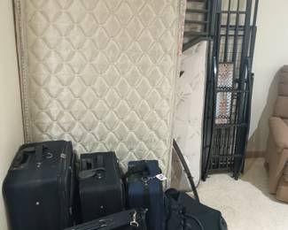 Bunk beds (some assembly required) and luggage