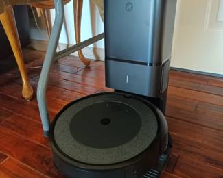 Roomba! I know, looked like a cat feeder to me to.