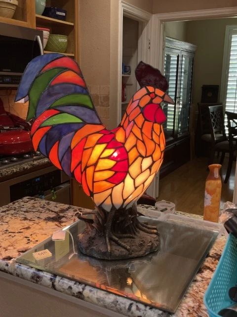 This beautiful rooster is approximately 18" tall.