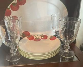 Upclose picture of Tomato Platter and Plates; Goblet glasses sold separately.