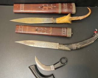 Decorative knives in sheaths