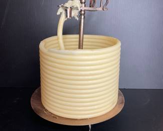 Candle by the Hour, self-extinguishing coil