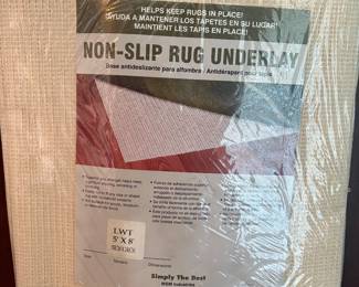 Non-slip material for rugs